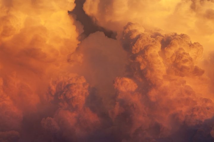 thick cloud formation during golden hour